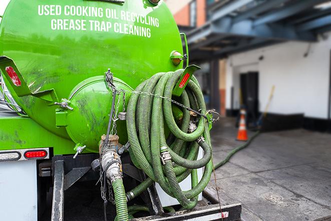 heavy-duty vacuum truck pumping out a grease trap in Agoura Hills, CA